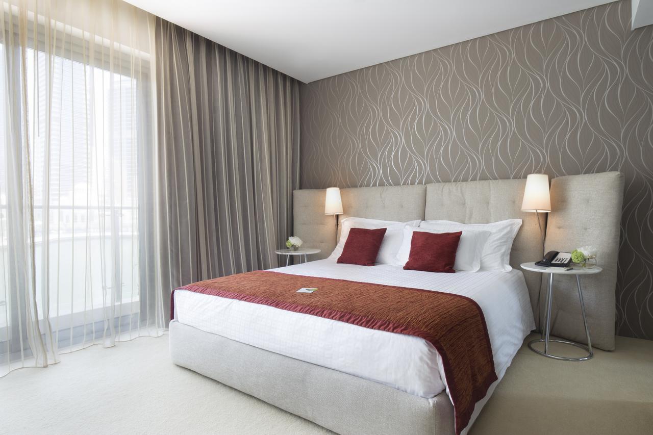 La Verda Suites And Villas Dubai Marina Exterior foto A bedroom at the hotel